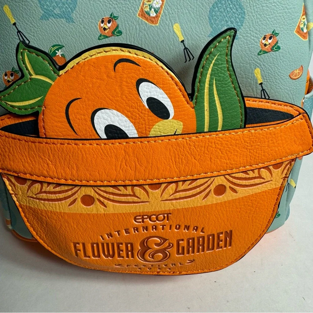 NWT. Disney Loungefly featuring Orange Bird. Approx. 10" H x 9 1/2" W x 5" D - Picture 10 of 14